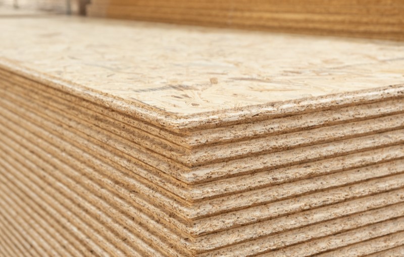 Vantagens do OSB | Placas de OSB empilhadas | Método Construtivo | Blog Alea